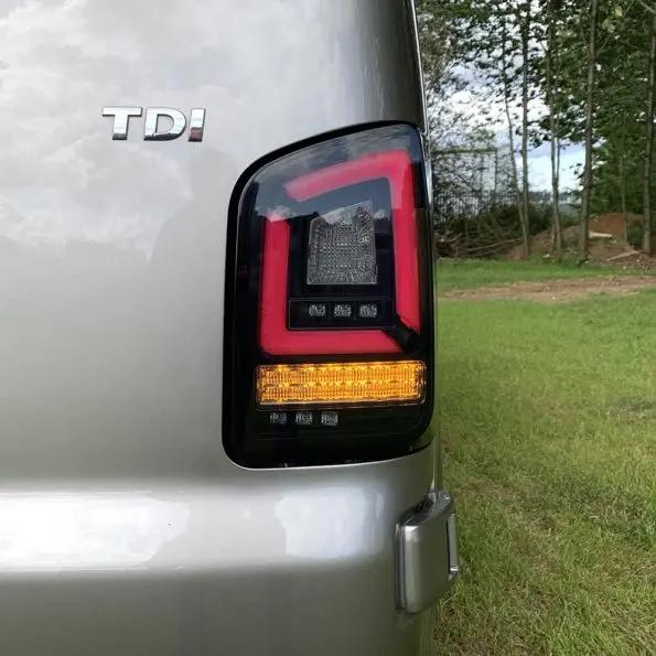 VW Transporter T6 – Rear Lights – Sequential Indicator – LED – RHD – Barn Doors – Black Smoke In stock with Supplier 7 to 14 days