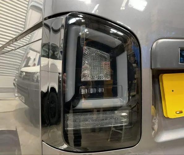 VW Transporter T5.1 (2010-15) – Rear Lights – Sequential Indicator – LED – RHD – Black Smoke In stock with Supplier 7 to 14 days