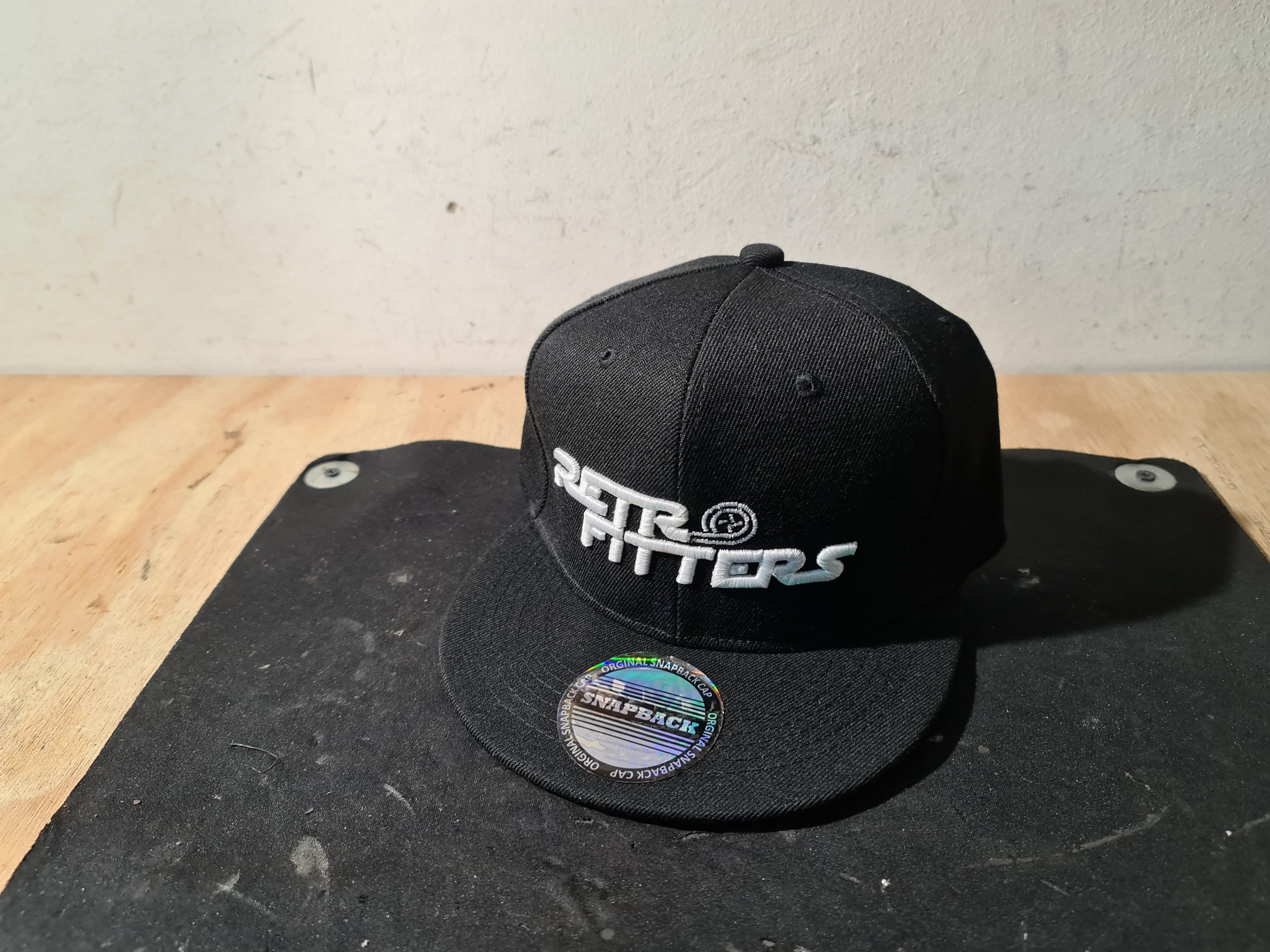 Retrofitters snapback platpiek pette